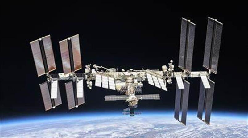 Deux Russes et une Américaine ont atteint vendredi la station spatiale internationale (ISS).